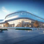 Modern fuar alanı binası: geniş cam cepheye ve etkileyici mimariye sahip büyük bir yapı.